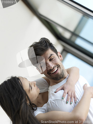 Image of relaxed young couple at home