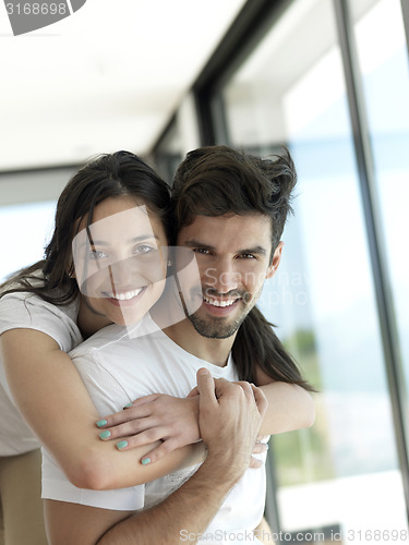 Image of relaxed young couple at home