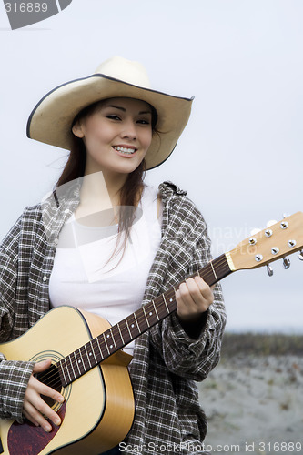 Image of Playing guitar