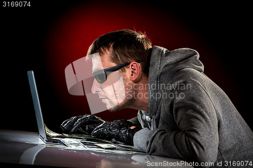 Image of Hacker with laptop