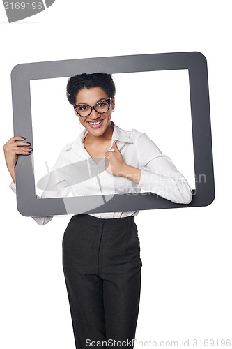 Image of Happy smiling business woman looking through frame