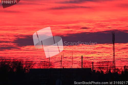 Image of scarlet sunset with evening clouds