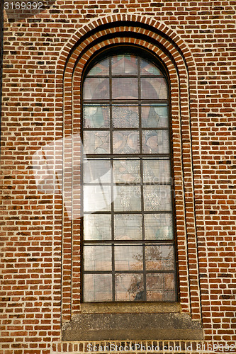 Image of rose window  italy  lombardy     in  the turbigo old   church   