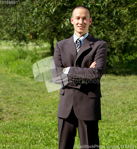 Image of Man working outdoors as a freelancer