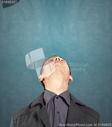 Image of Businessman Looking Upwards