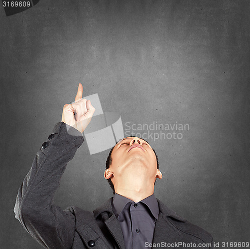Image of Businessman Looking Upwards