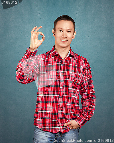 Image of Asian Man With Folded Hands