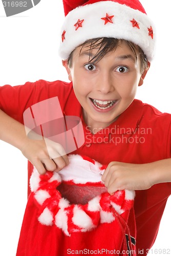 Image of Boy holding a toy sack