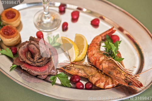 Image of Grilled shrimps and beef meat 