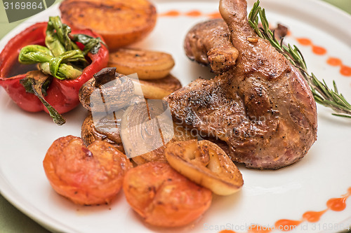 Image of grilled duck legs