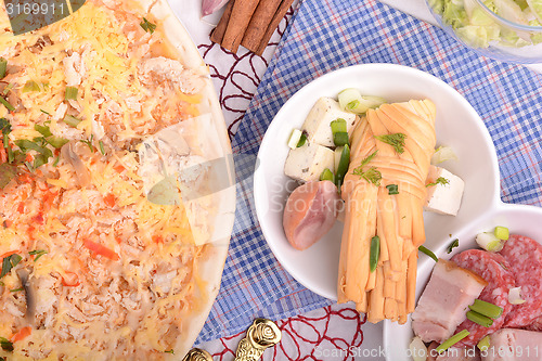 Image of Beef pizza with bread, cinnamon and lemon