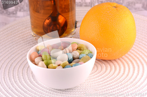 Image of sweet cake on white plate and fruits