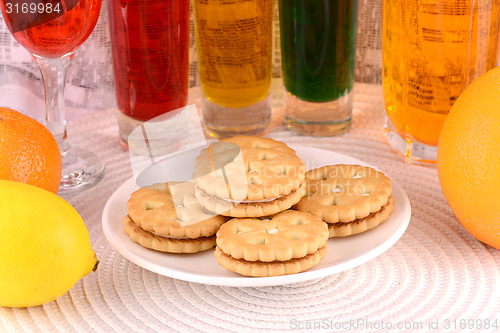 Image of sweet cake on white plate and fruits