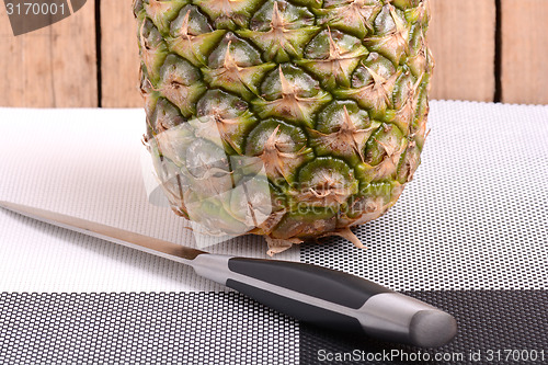 Image of fresh pineapple with corn and orange