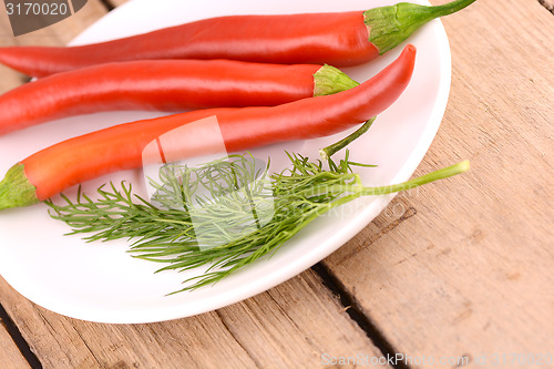 Image of a lot of pepper on white plate