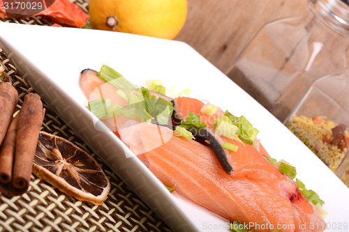 Image of Slice of red fish salmon with fruits