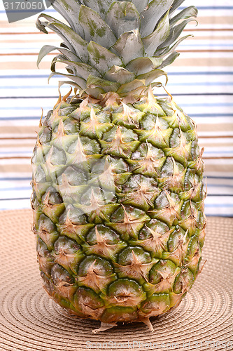 Image of fresh pineapple with corn and orange