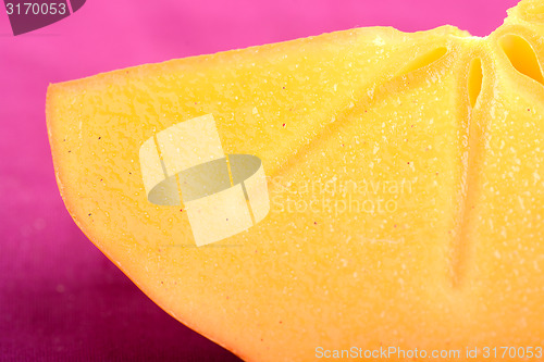 Image of sharon kakis sliced - japanese persimmons close up