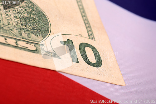 Image of dollars on american flag