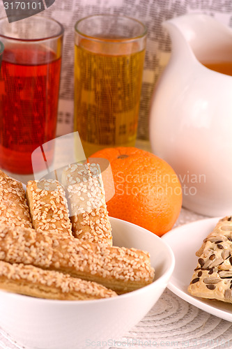 Image of sweet cake on white plate and fruits
