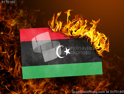 Image of Flag burning - Libya