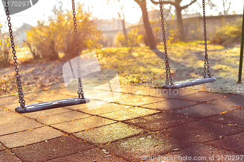 Image of Playground swing in the park