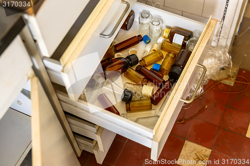 Image of Cupboard with opened drawer