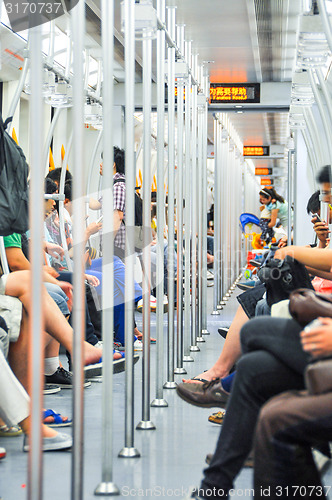 Image of subway  passengers