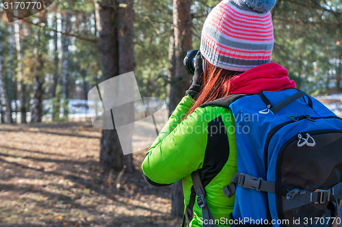 Image of Nature photographer taking photos