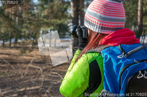 Image of Nature photographer taking photos