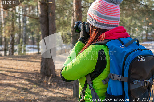 Image of Nature photographer taking photos