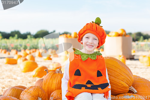 Image of kid at pumpkin patch