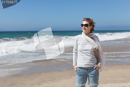 Image of casual woman at the beach