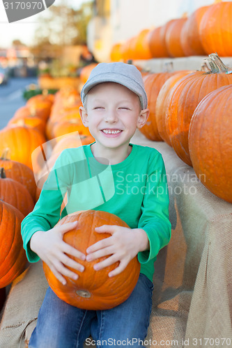 Image of kid at pumpkin patch