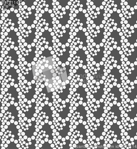 Image of Monochrome pattern with white circles on gray forming waves