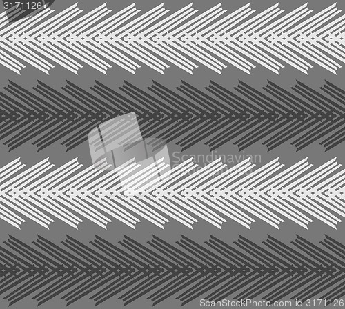 Image of Monochrome pattern with striped white and black chevron on dark 