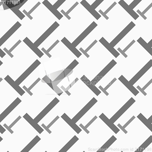 Image of Monochrome pattern with big and small t shapes
