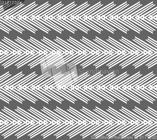 Image of Monochrome pattern with striped white chevron on dark gray