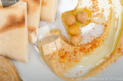 Image of Hummus with pita bread 