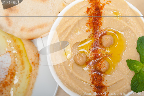 Image of Hummus with pita bread 