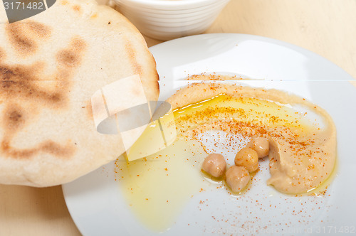 Image of Hummus with pita bread 