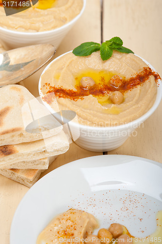 Image of Hummus with pita bread 