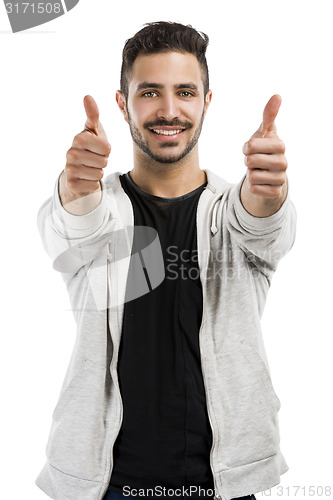 Image of Man smiling with thumbs up