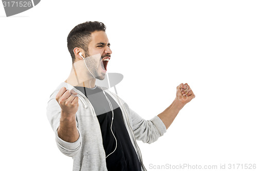 Image of Man smiling and listen music