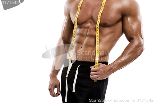 Image of Muscle man with measuring tape