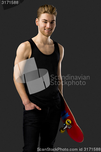 Image of Young man with a skateboard