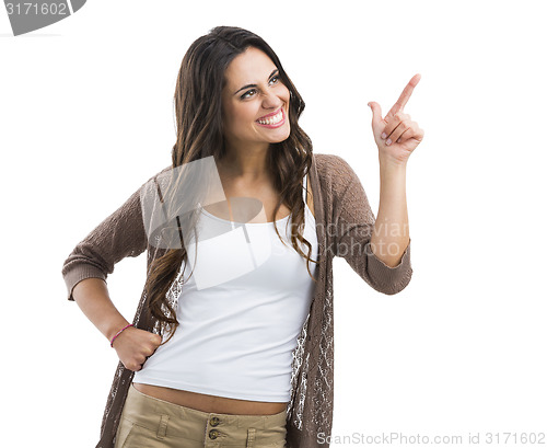 Image of Beautiful woman pointing to something