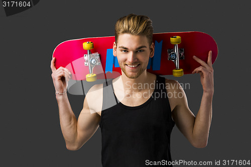 Image of Young man with a skateboard