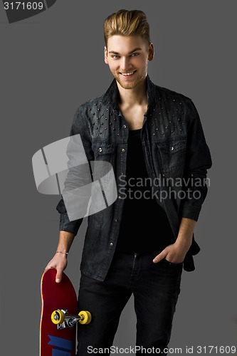 Image of Young man with a skateboard