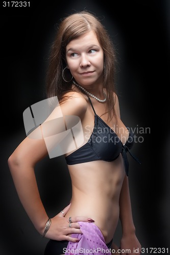 Image of Attractive woman in black bra